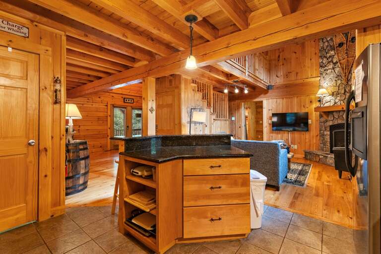 Granite Bar Top in Kitchen Adjacent to the Living Room Granite Bar Top in Kitchen Adjacent to the Living Room
