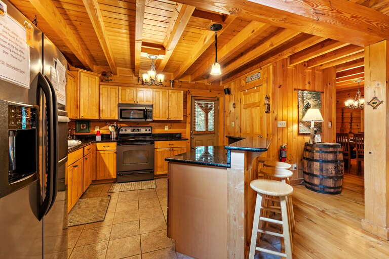 High End Appliances and Bar Seating High End Appliances and Bar Seating