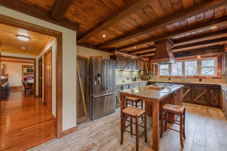 Custom Kitchen with Stainless Appliances and Granite Island