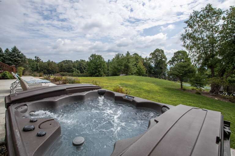 Hot Tub and Lounge Chairs in Lower Courtyard