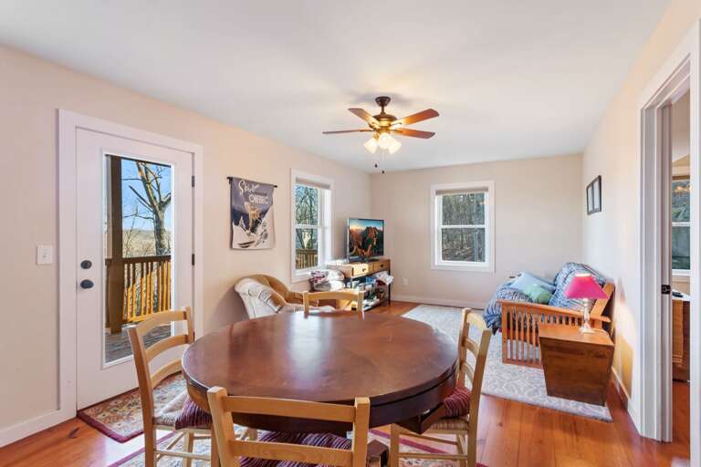 Downstairs Den with Card Table that converts to Bumper Pool, Lower Covered Deck with Long Range Views