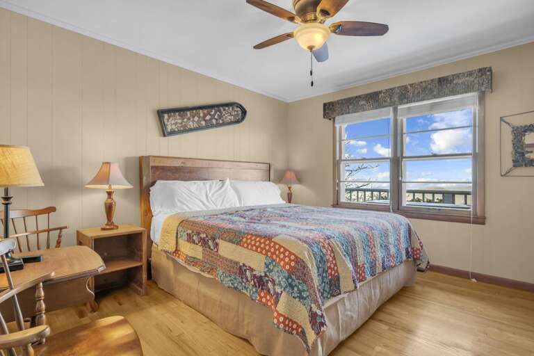 Main Level King Bedroom with TV and Mountain Views