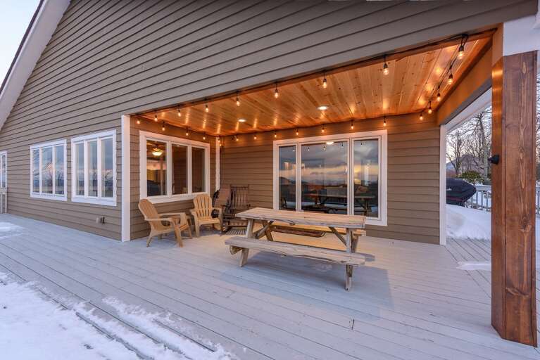 Outdoor Dining Table on Main Level Deck under Roof
