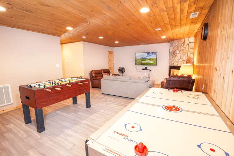 Game Room and Den with Tongue-in-Groove Ceiling and Accent Wall