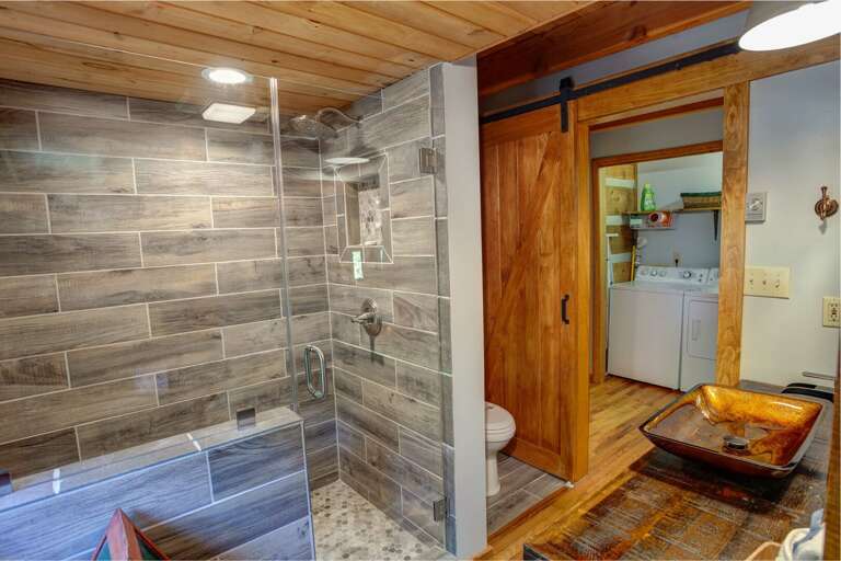 Main Level Full Bathroom with Huge Tile Shower accessible from Master Bedroom and Kitchen