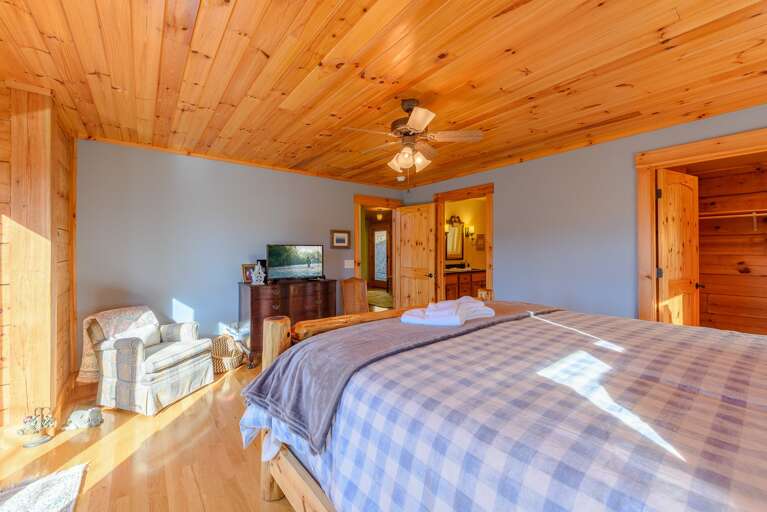 King Master Suite with HDTV and Walk-in Closet