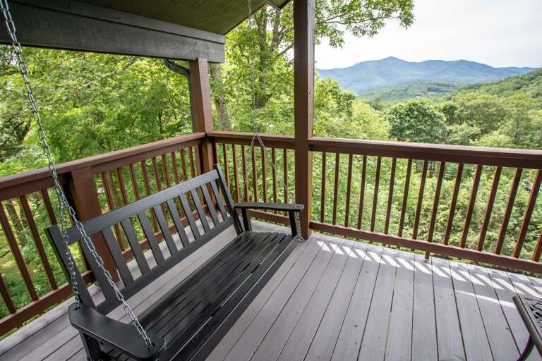 Covered Private Balcony with Porch Swing for Upstairs Queen Bedroom