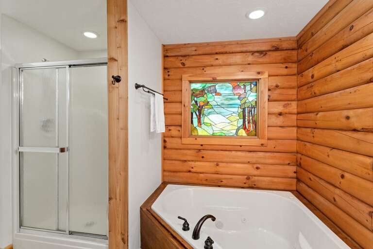 Jetted Soaking Tub with Separate Shower in the Master Bathroom