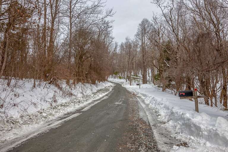 Old Johns River Road near Cabin, Paved Most of the Way, Gravel toward End; Plowed in Winter for Safe Access