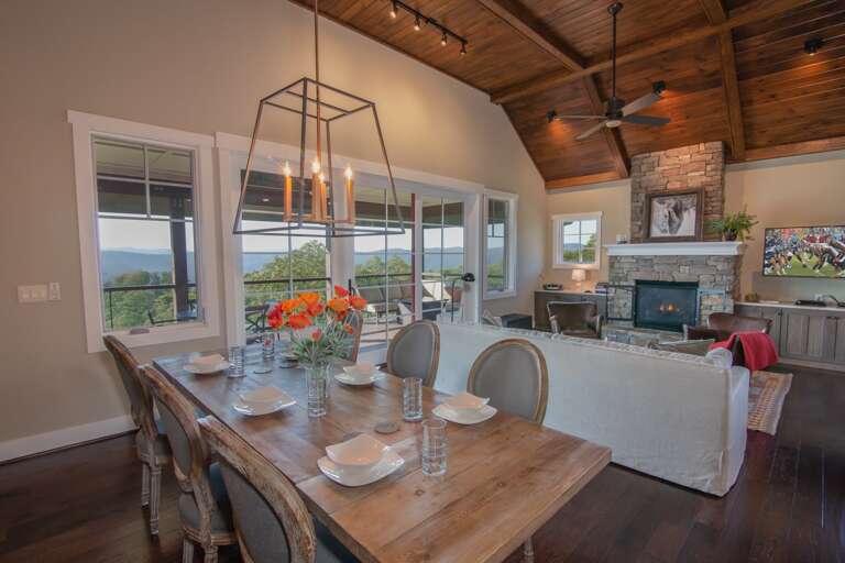 Banquet-style Dining Table open to Mountain Views, near Glass Door to Grill and Deck Banquet-style Dining Table open to Mountain Views, near Glass Door to Grill and Deck