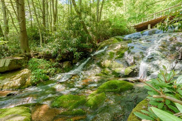 Boulder Falls is a short walk below the house Boulder Falls is a short walk below the house