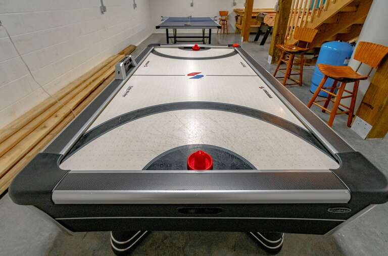Ping Pong and Air Hockey Game Tables in Lower Level Game Room