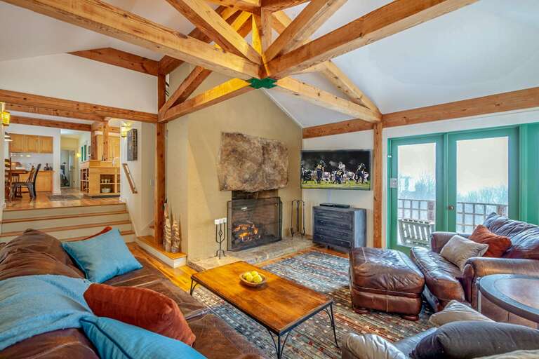 Open living area with a gas fireplace