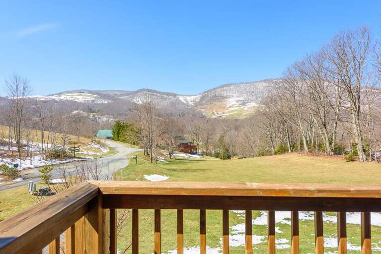 Beautiful views of surrounding mountains from private deck Beautiful views of surrounding mountains from private deck
