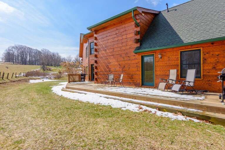 Back Deck with gas grill, lots of privacy and beautiful view of rolling pasture land behind home Back Deck with gas grill, lots of privacy and beautiful view of rolling pasture land behind home