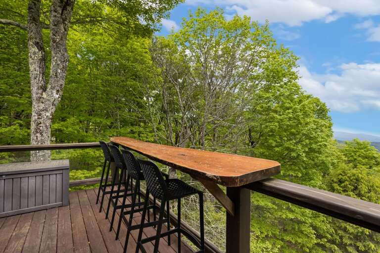Custom Slab Dining Counter with Layered Mountain Views