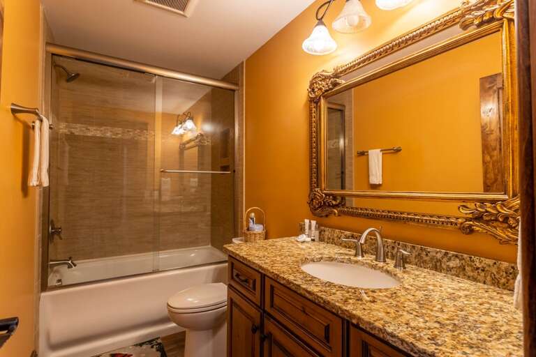 Full Hallway Bathroom Downstairs with Tub and Shower