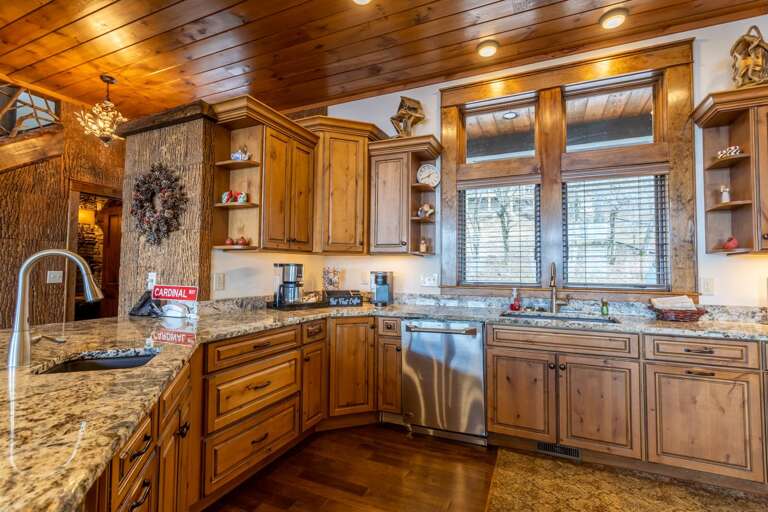 Kitchen with Granite Counters and Custom Cabinetry