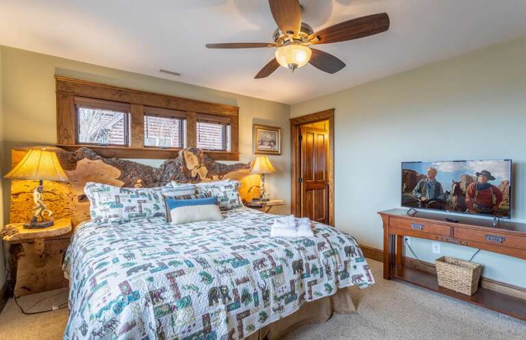 Main Level King Suite with Long Range Views and Custom Slab Wood Bed