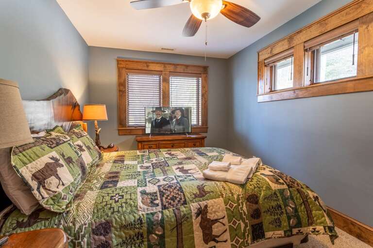 Main Level Queen Suite with Custom Cherry Bed and HDTV