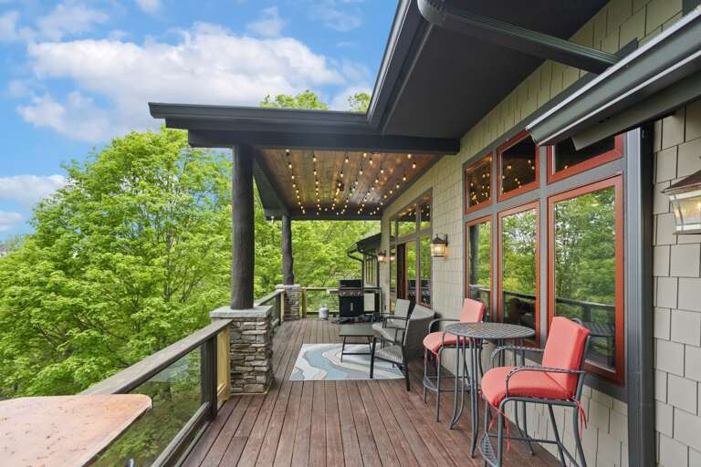 Rear Deck on Main Level with Covered Seating and Open-air Dining