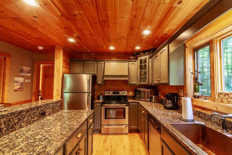 Wooden Interior Kitchen With Stainless Steel Appliances Wooden Interior Kitchen With Stainless Steel Appliances