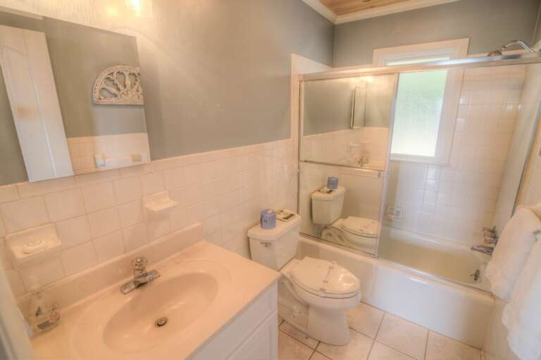 Full Bathroom with Tiled Tub & Shower