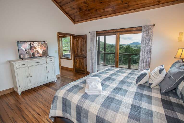 King Master Suite with HD Smart TV, Glass Doors open to Mountain Views