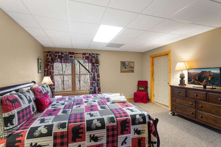 King Bed and TV in the Lower Level