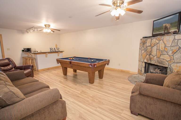 Fireside Lodge Game Room with Pool Table, Foosball, Flatscreen TV, Gas Fireplace and Bar with Granite Counters