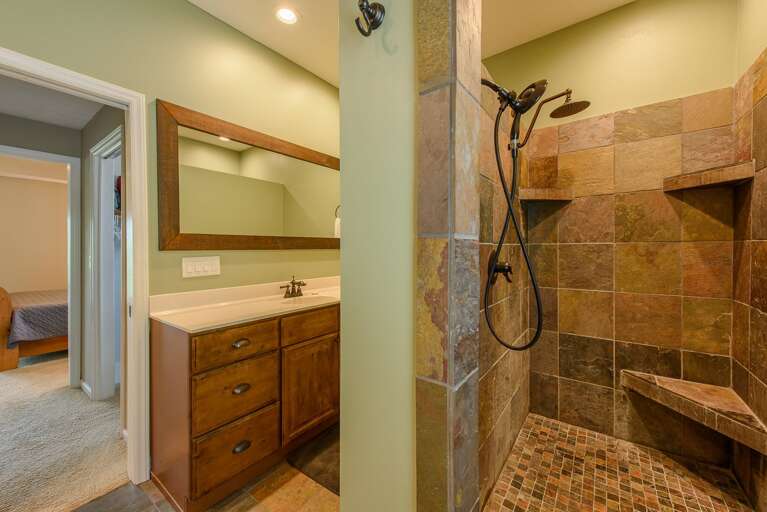 Dual shower heads in large tiled shower