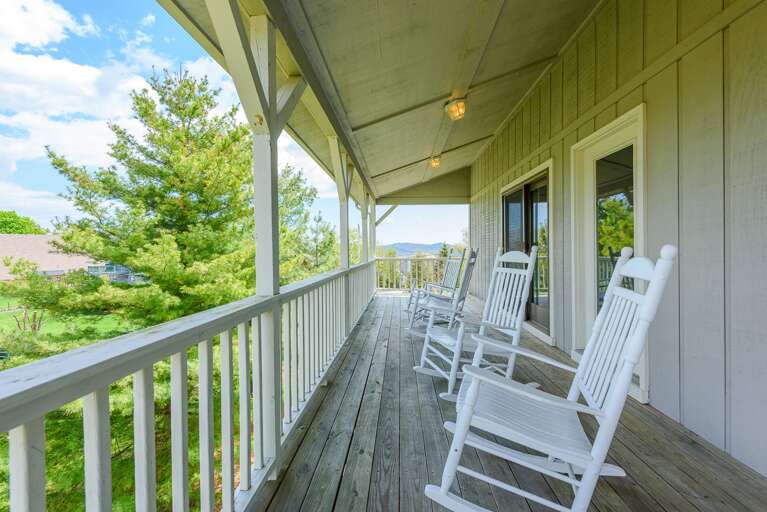 Upper level porch with rocking chairs, beautiful views