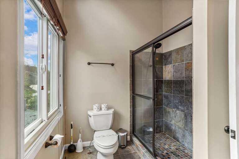 Upstairs Bathroom with Tiled Shower