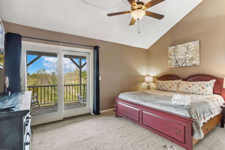 Upstairs King Bedroom with Access to the Upper Level Deck
