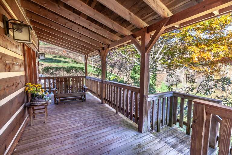 Glider Located Right Outside Master Bedroom on the side of Main Level Deck