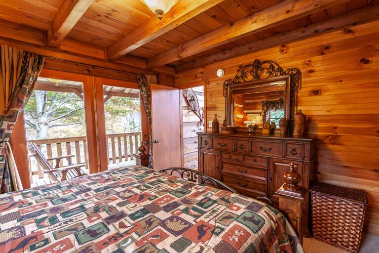 King Master Suite with Glass Doors out onto Private Nook on Covered Porch, *HDTV has been added since picture was taken!*