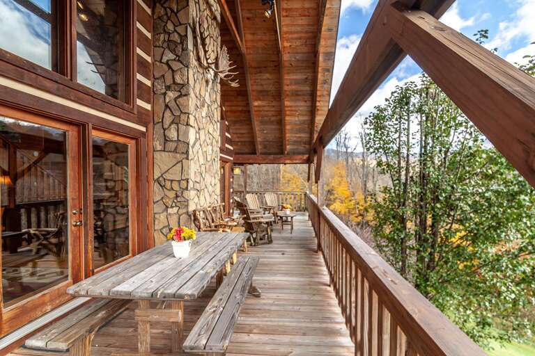 Rear Deck on Main Level with Picnic Table and Lots of Deck Furniture to Enjoy Mountain Views