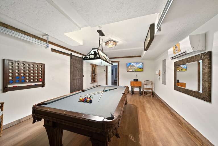 Finished Garage Game Room with Pool Table, Games and TV