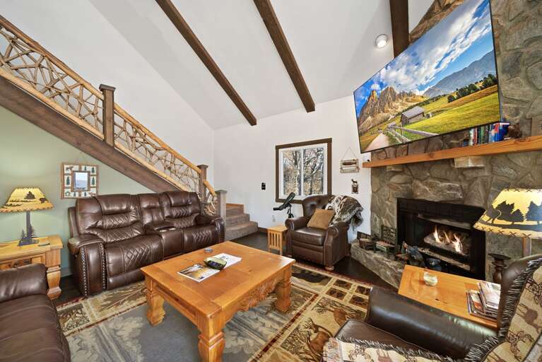 Main Level Living Room with Gas Log Fireplace and HD Smart TV