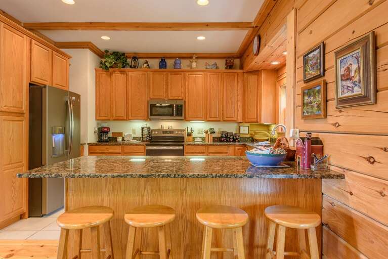 Open Kitchen with Extra Seating at Bar