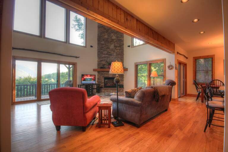 Living Area with Floor to Ceiling Stone Fireplace