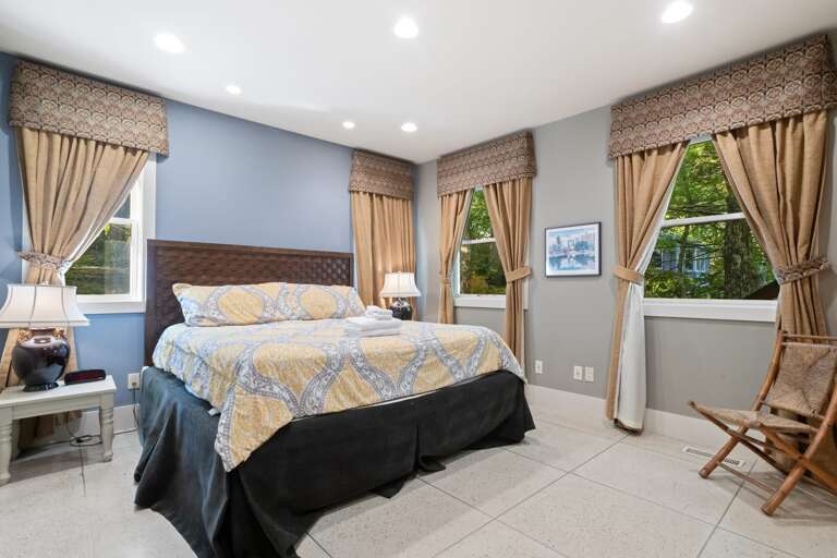 King Bedroom on Main Floor, Full Bathroom Located Adjacent in Hall King Bedroom on Main Floor, Full Bathroom Located Adjacent in Hall