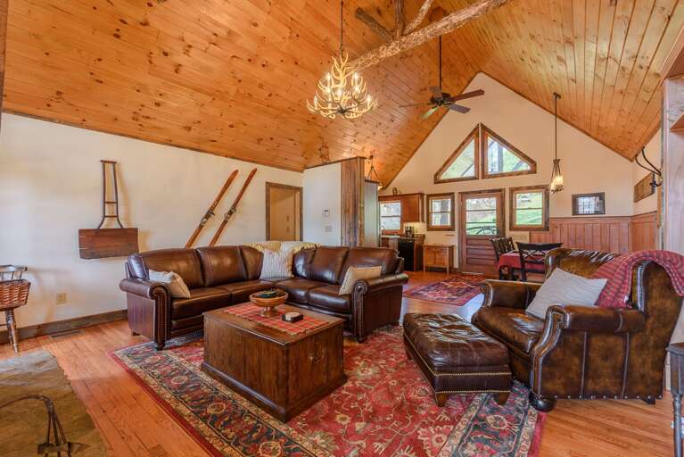Great Room with Stone Fireplace, Vaulted Tongue & Groove Ceiling Great Room with Stone Fireplace, Vaulted Tongue & Groove Ceiling