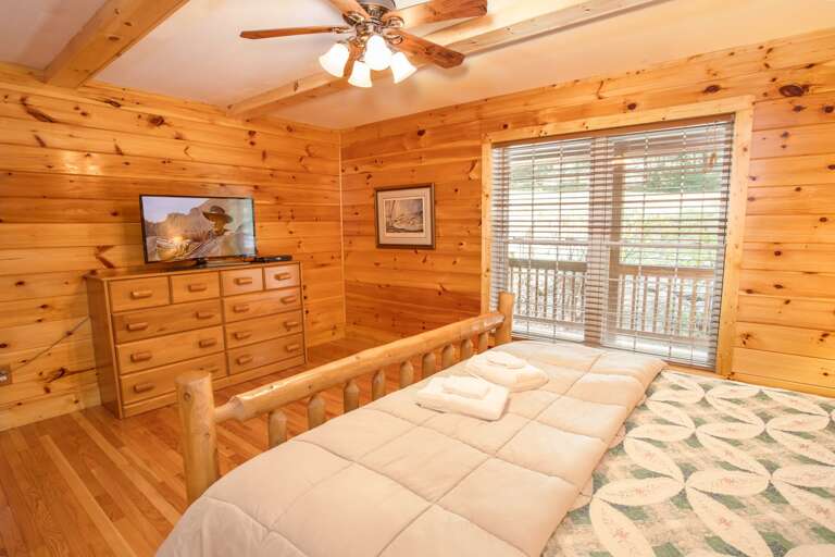 King Master Suite 1 with Wood Framed Bed