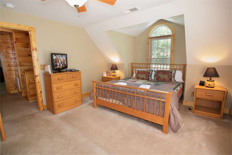 King Master Suite 2 with Wooden Framed Bed