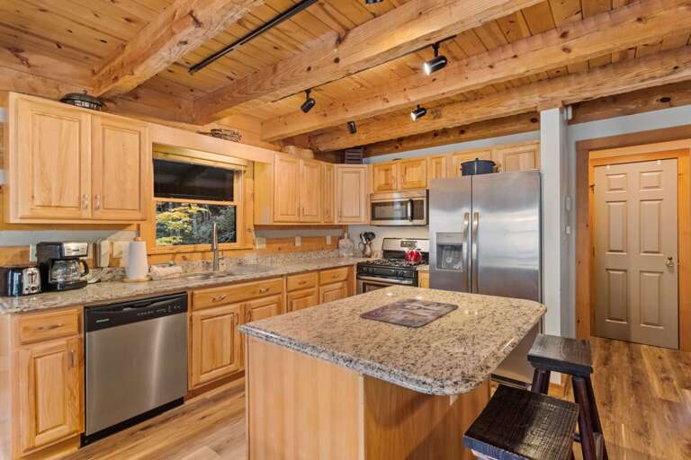 Kitchen with Granite Countertops and Stainless Appliances Kitchen with Granite Countertops and Stainless Appliances