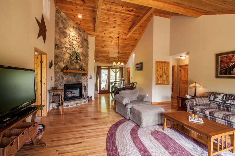 Main Level Living Room with Views, Stone Fireplace, Vaulted Ceilings, Flat Screen TV