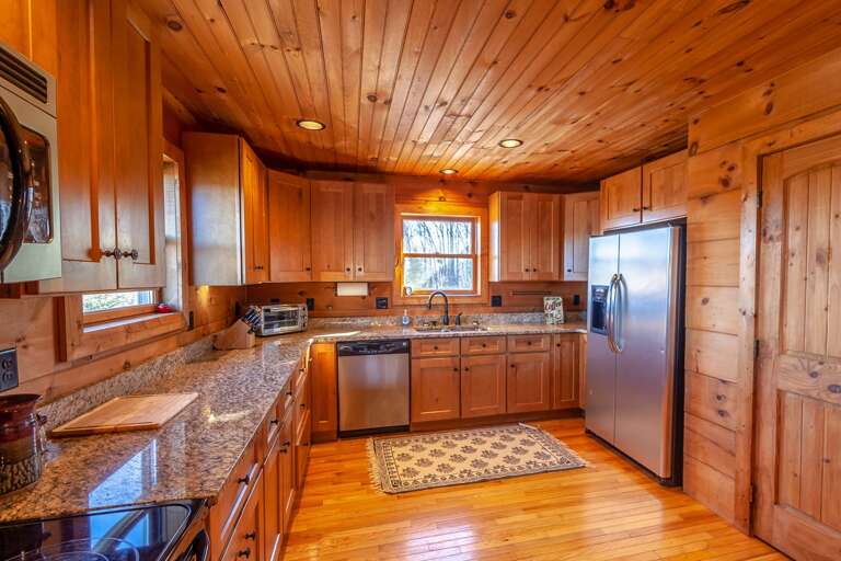 Kitchen with Stainless Appliances and Granite Counters