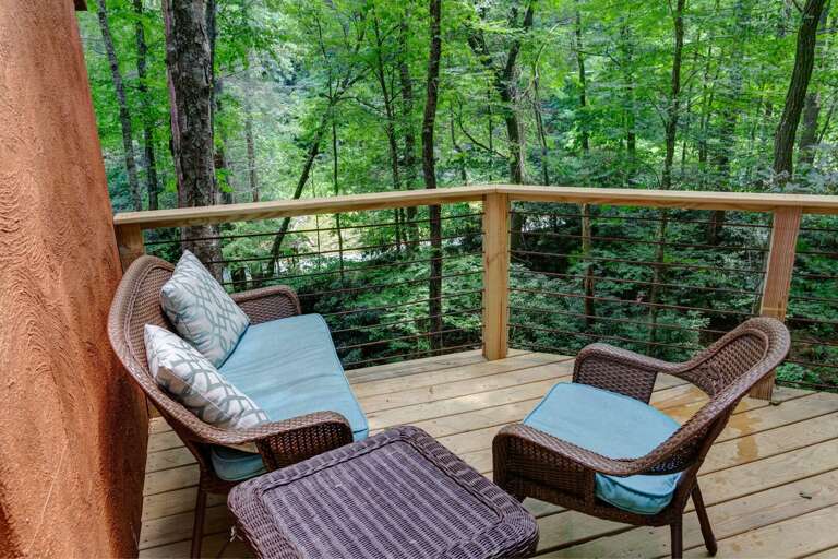 Cozy Outdoor Sitting Area on deck at Little Timber Creek Cabin