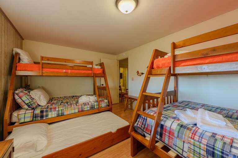 Downstairs Bunk Room with 2 Twin over Full Bunk Beds and a Twin Trundle Bed